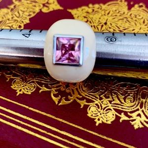 LGA gold and off whit ring with pink stone. Size 5